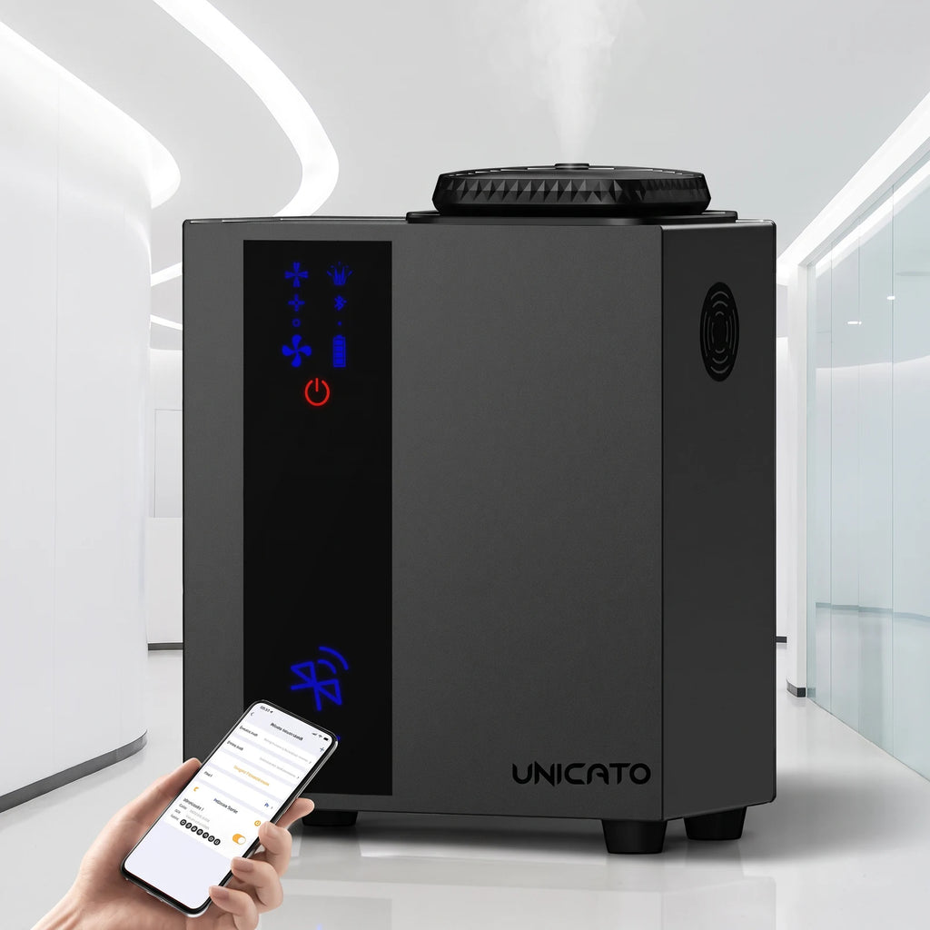 TORI A300 black diffuser in a modern hall, controlled from a smartphone app
