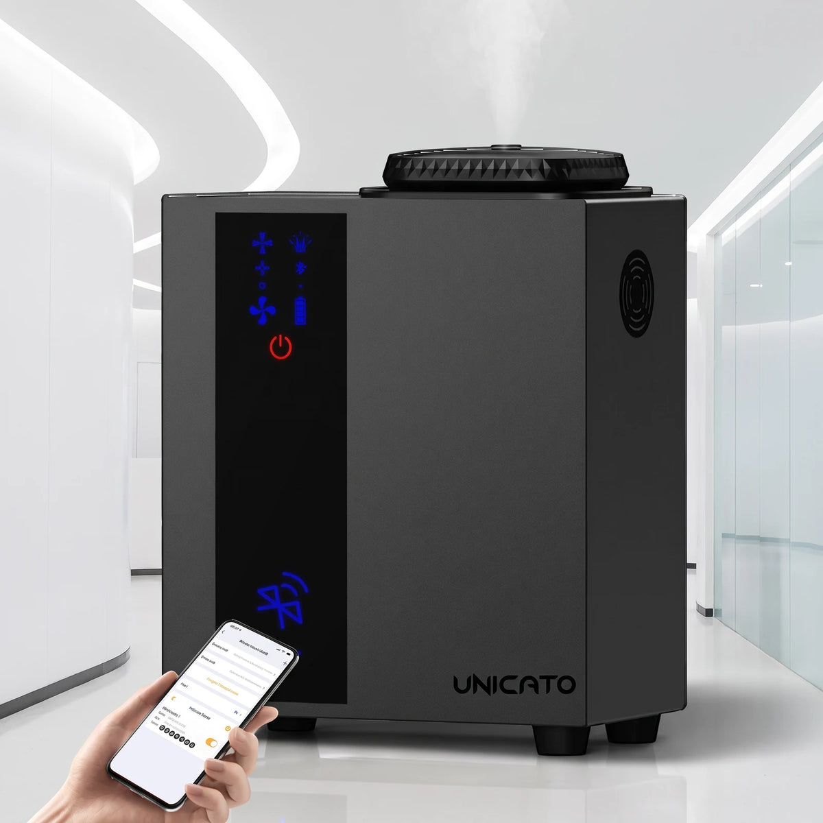 TORI A300 black diffuser in a modern hall, controlled from a smartphone app